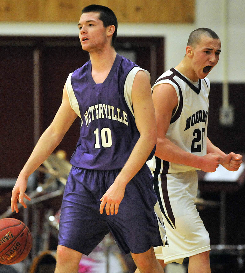 Photo by Michael G. Seamans Game action from Eastern Class B boys playoff game at Nokomis High School in Newport Wednesday night. Nokomis defeated Waterville 50-49 in overtime..