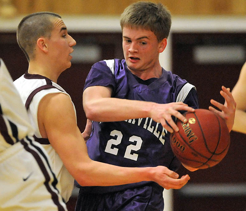 Photo by Michael G. Seamans Game action from Eastern Class B boys playoff game at Nokomis High School in Newport Wednesday night. Nokomis defeated Waterville 50-49 in overtime..