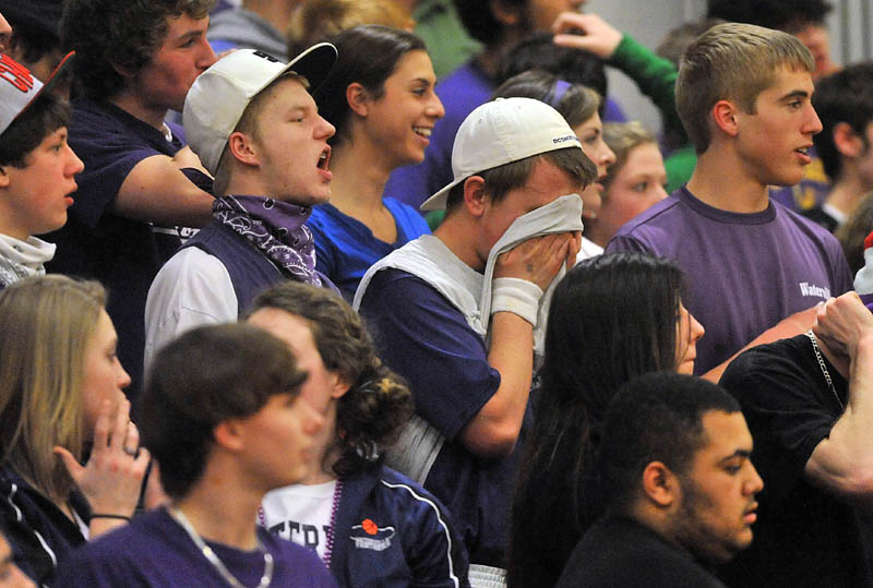 Photo by Michael G. Seamans Game action from Eastern Class B boys playoff game at Nokomis High School in Newport Wednesday night. Nokomis defeated Waterville 50-49 in overtime..