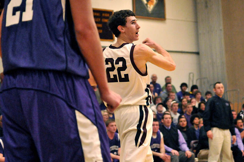 Photo by Michael G. Seamans Game action from Eastern Class B boys playoff game at Nokomis High School in Newport Wednesday night. Nokomis defeated Waterville 50-49 in overtime..