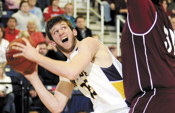 EYES ON THE PRIZE: Mt. Blue High School center Cam Sennick, left — like Hampden guard Christian McCue — won the Kennebec Valley Athletic Conference North Division Player of the Year and is a semifinalist for Mr. Maine Basketball. At 8:45 tonight, they will meet for the third time this season when their teams play for the Eastern Maine Class A championship at the Augusta Civic Center.