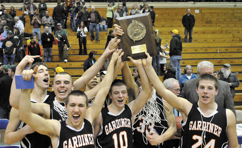 Tyler Jamison, Jake Palmer, Travis Kelley, Justin Lovely, Aaron Toman and Matt Hall celebrate after Gardiner won its first regional title.