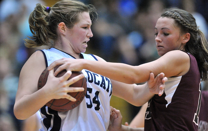 Kylie Richards, right, of Nokomis defends against Meredith Stewart of Presque Isle.