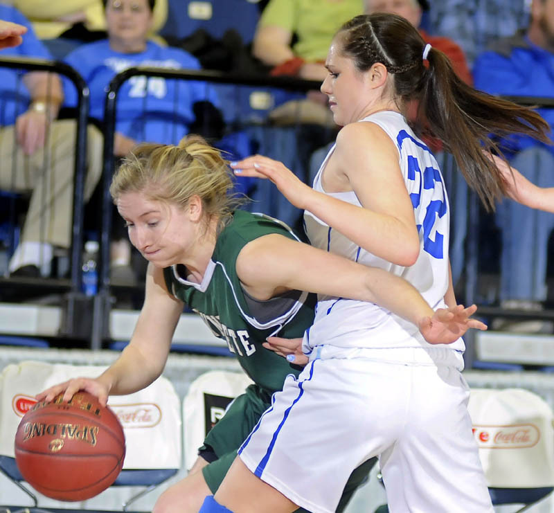 Mikayla Luce of Mt. Abram attempts to get past Alexandra Andrews during Boothbay’s 58-42 Western Class C quarterfinal victory.