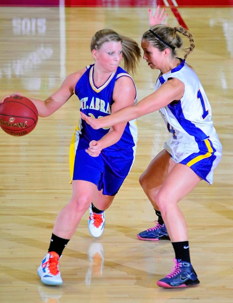 Mikayla Luce of Mt. Abram attempts to get past Alexandra Andrews during Boothbay’s 58-42 Western Class C quarterfinal victory.