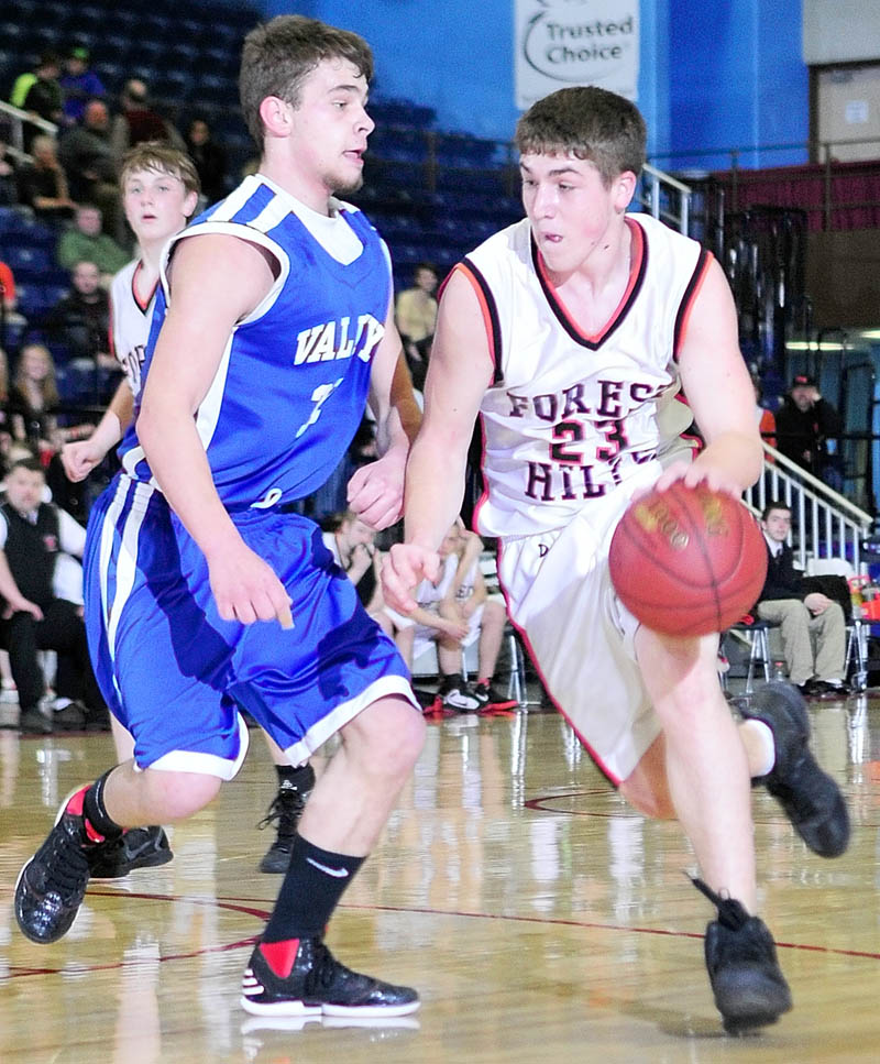 LEADING THE WAY: Forest Hills junior forward Evan Worster, right, scored a Western D tournament record 106 points in three games to lead the Tigers to the Class D state championship game, where they will face Eastern D champ Jonesport-Beals at 2:45 p.m. today.