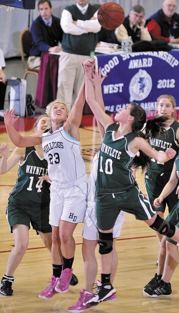 HERE WE GO AGAIN: Carylanne Wolfington, left, and the Hall-Dale girls basketball team will play for their second straight Class C state title tonight when they face Central at the Augusta Civic Center.