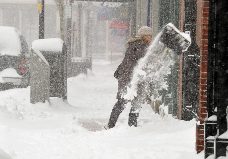 Thursday’s storm dumped 13 inches of snow on Portland and the steady accumulation kept Hildin McKeagney, general manager of Abacus, busy at her Exchange Street store.