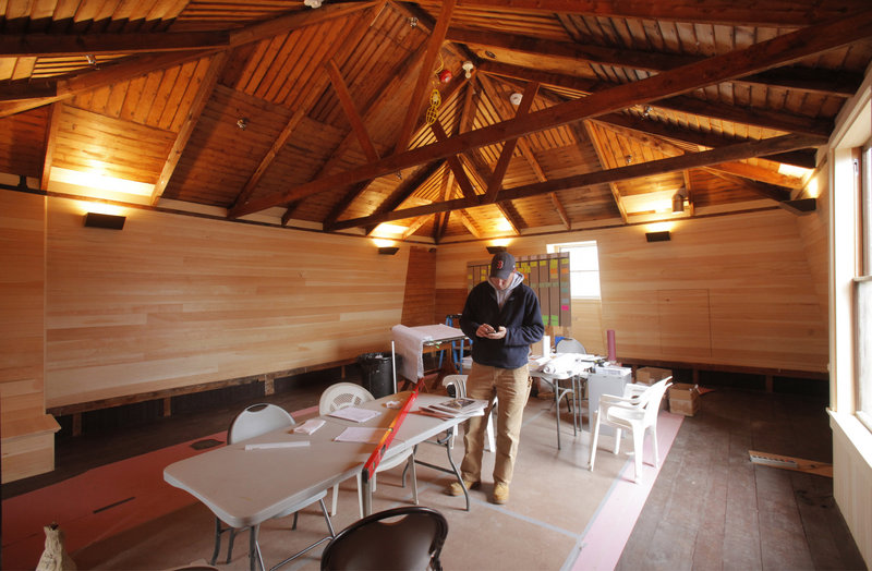 Geoffrey Goba, site superintendent for construction managers Marc Truant & Associates, works on the second floor of Winslow Homer’s studio at Prouts Neck in Scarborough last month. The restoration of the National Historic Landmark will be the centerpiece of the Portland Museum of Art’s tribute to Homer later this year.