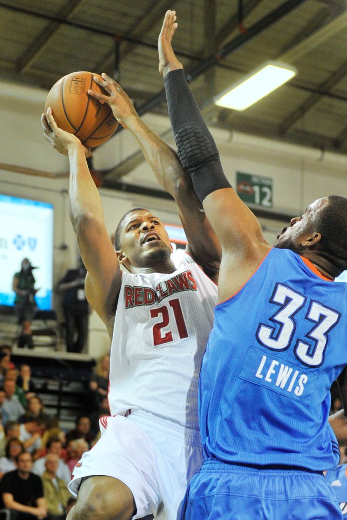 Morris Almond of the Maine Red Claws is known for his scoring – driving on Marcus Lewis of Tulsa – but it was his blocked shot with two seconds left Friday night that provided a victory.