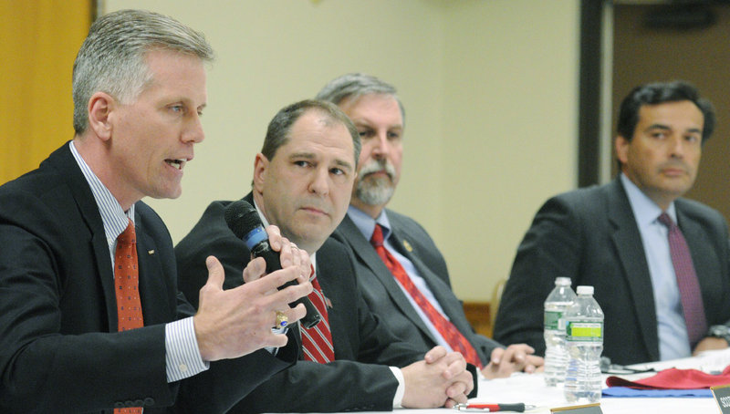 Charlie Summers, left, answers a question as fellow candidates Scott D’Amboise, William Schneider and Rick Bennett look on during the GOP For ME debate April 13 at the Elks Club in Augusta.