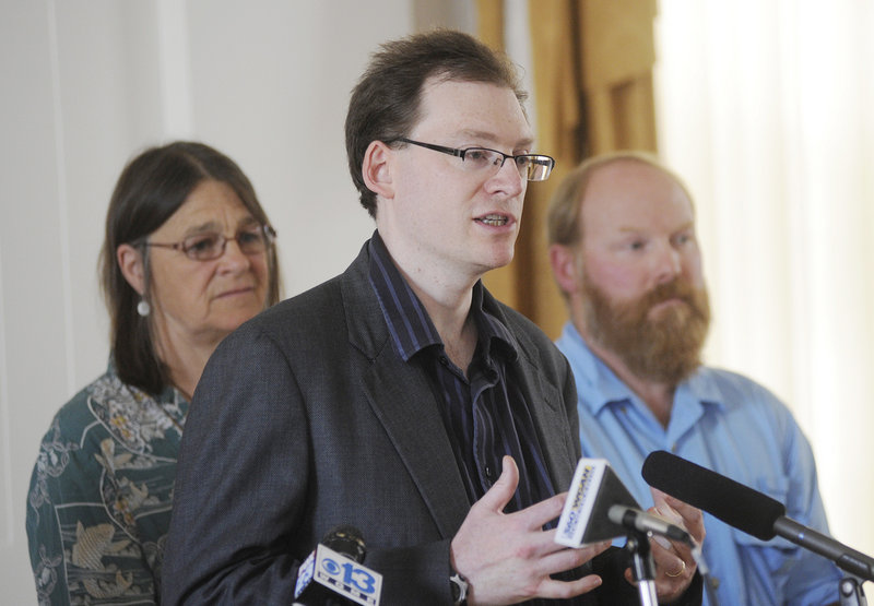 Dylan Voorhees of the Natural Resources Council of Maine speaks Tuesday at Portland City Hall. “The risk of pushing tar sands through this pipeline is just too great,” he said.