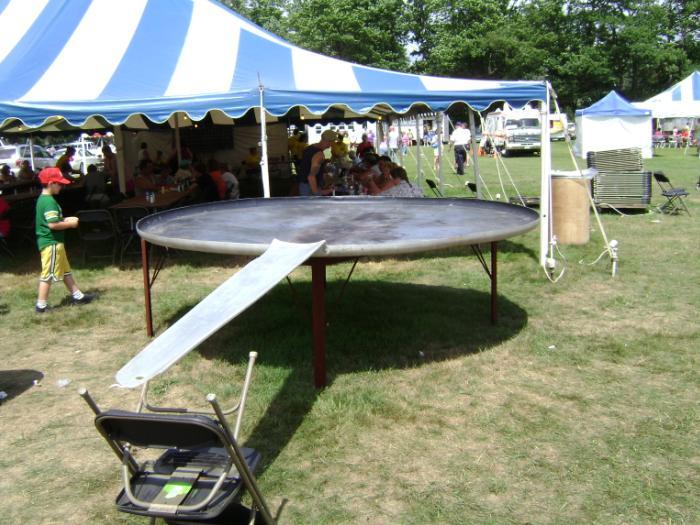 Central Maine Egg Festival is being held in Pittsfield through Saturday. The festival features "egglympics," parade, fireworks, chicken barbecue and world's largest frying pan, which was made in 1973, is 10 feet in diameter and weighs 300 pounds.