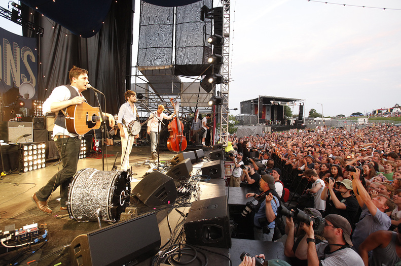 The members of Mumford & Sons perform during the Gentlemen of the Road tour at the Eastern Prom in Portland. The band was the last of eight to play at the daylong event.