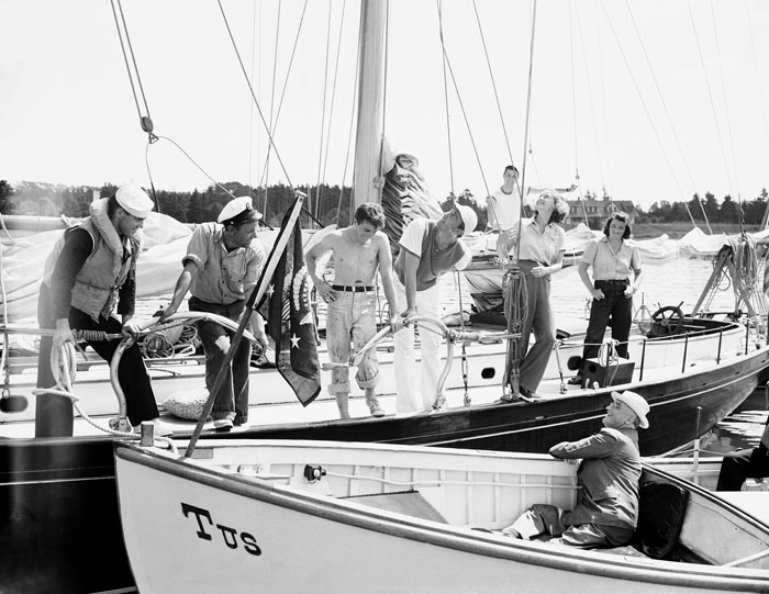 Franklin D. Roosevelt (in launch) is greeted at the schooner Benham, his son’s yacht, off Campobello Island on Aug. 14, 1939. Franklin D. Roosevelt Jr. and his wife (both looking aloft) greeted the president.