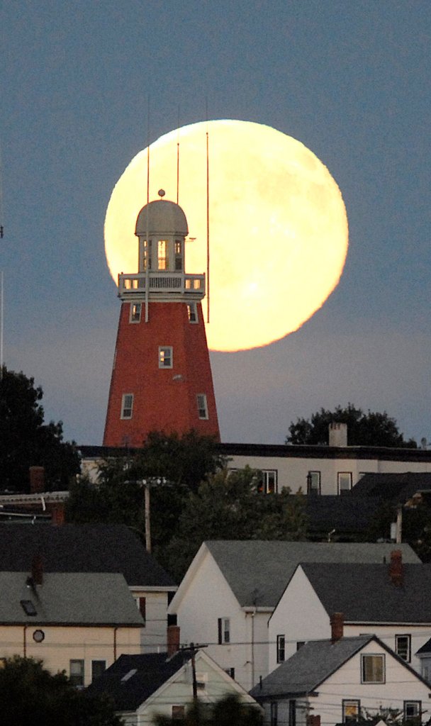 The Portland Observatory is bathed in the light of a full moon on Sept. 15, 2008. Friday night's blue moon – the second full moon of the month – is likely to look much the same.