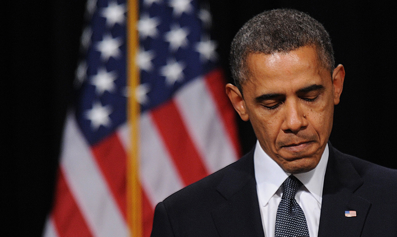 “You are not alone in your grief,” President Obama told the residents of Newtown, Conn., Sunday. “Our world, too, has been torn apart.”