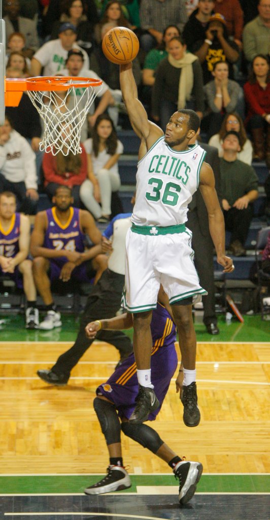 Chris Wright of the Red Claws dunks on a breakaway in the fourth quarter. He finished with 19 points in the game.