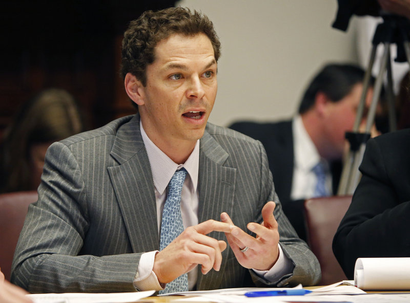 State Sen. Justin Alfond, D-Portland, questions spending cuts outlined by the Appropriations Committee, Friday, Jan. 11, 2013, at the State House in Augusta, Maine. The LePage administration on Friday presented a proposed $6.3 billion budget that eliminates more than 200 state positions, seeks to share the state's teacher retirement costs with local school districts and makes changes in the state welfare system to address an expected $40 million reduction in federal matches.