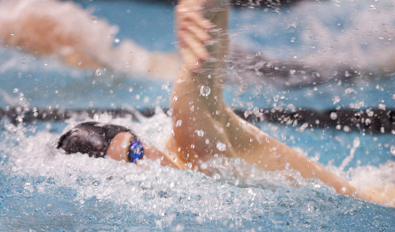 Nick Sundquist, a senior at Windham, powers his way to a win in the 200-yard freestyle event in the Class A state swimming championships Monday at Bowdoin College.