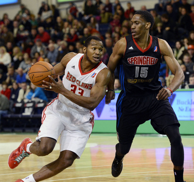 Chris Wright tries to turn the corner against Paul Carter of the Armor. Wright finished with 25 points and 16 rebounds to pace the Red Claws, who don’t play again at the Expo until March 1.