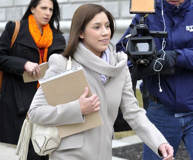 Former Zumba dance instructor Alexis Wright leaves Cumberland County Courthouse after a meeting with attorneys to discuss a plea agreement prior to her upcoming trial for prostitution.