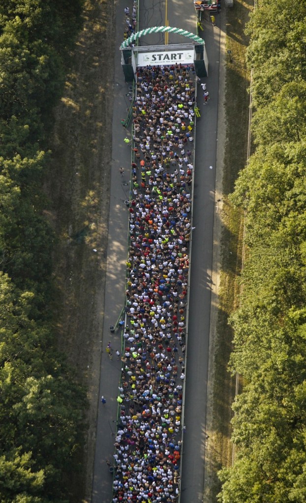 In this Aug. 4, 2012 file photo, runners compete in the Beach to Beacon 10K road race. Dave Weatherbie, president of the Beach to Beacon race, said it’s too early to talk about any extra security measures that might be added to the 2013 event following the Boston Marathon bombings.