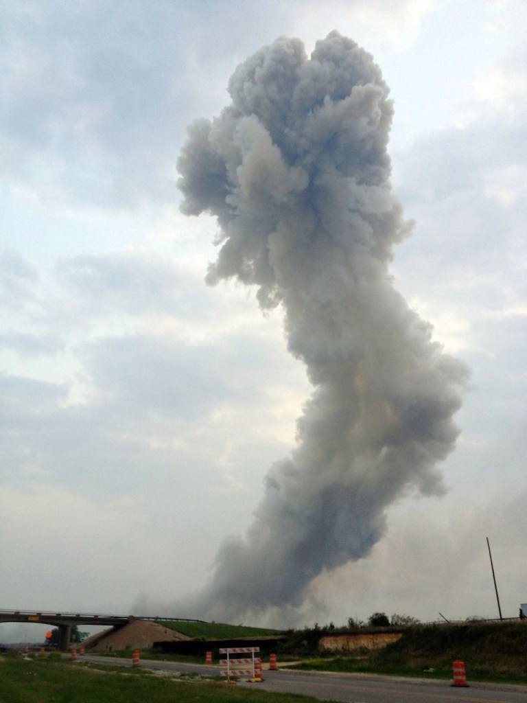 In this Wednesday, April 17, 2013, photo provided by Joe Berti, a plume of smoke rises from a fertilizer plant fire near Waco, Texas. A massive explosion at the West Fertilizer Co. killed as many as 15 people and injured more than 160, officials said Thursday morning. (AP Photo/Joe Berti)