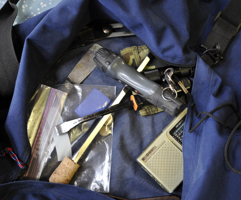 Tools recovered in a bag that Christopher Knight was carrying when he was apprehended at Pine Tree Camp in Rome Tuesday.