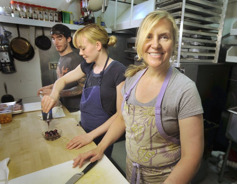 Krista Kern Desjarlais poses in the kitchen at Bresca, on Middle Street in Portland. She's opening a snack shack, Bresca and the Honeybee, at Outlet Beach in New Gloucester.