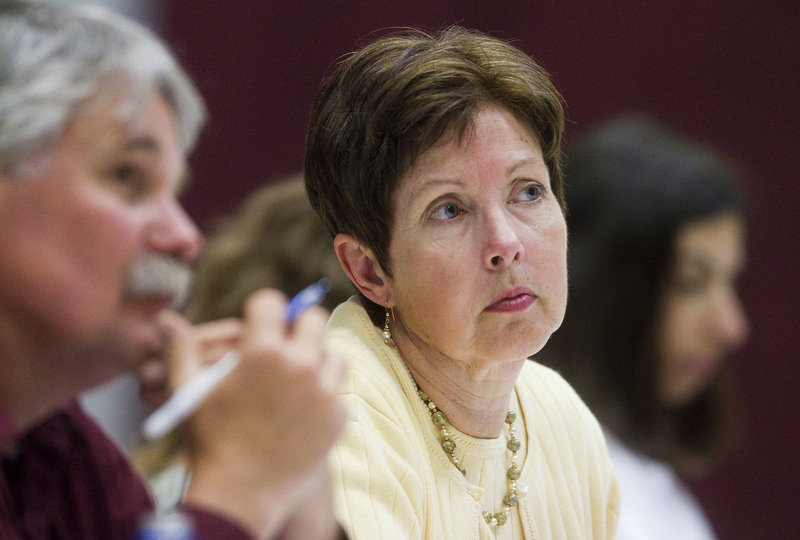 Patricia Aho, commissioner of the Maine Department of Environmental Protection, is shown at a public hearing in the Hancock County town of Aurora earlier this month. In 2008, when she was lobbying for a number of corporate interests, Aho had fought to stop the Kid Safe Products Act from becoming law. And just weeks before she was appointed to the DEP, Aho was working as the principal lobbyist for the American Chemistry Council, which also opposed the law and has sought to weaken it.