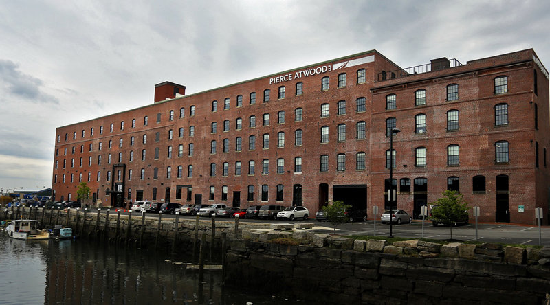 Current and former employees of the Maine Department of Environmental Protection say they’ve been pressured against vigorously implementing or enforcing laws that have long been opposed by companies represented by Commissioner Patricia Aho’s former employer, Pierce Atwood, the state’s largest law firm. The firm’s Portland office building on Commercial Street is pictured earlier this month.