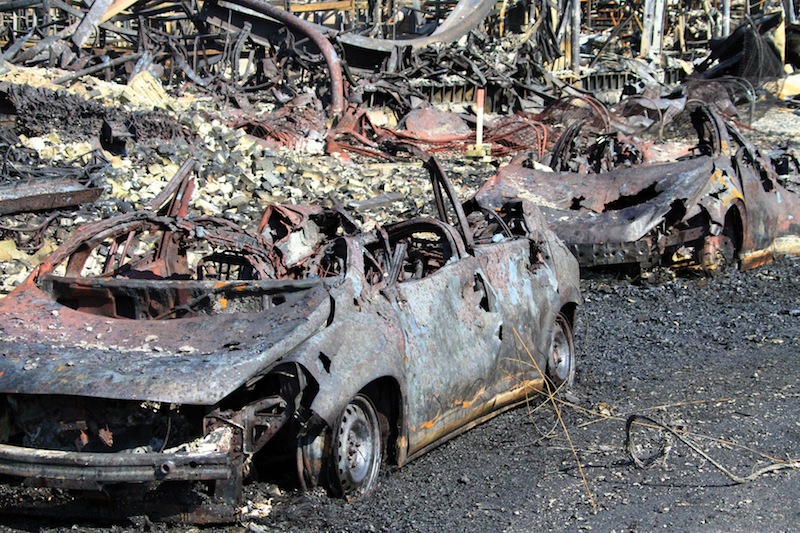 This photo provided by Surete du Quebec, shows debris from a runaway train on Monday, July 8, 2013 in Lac-Megantic, Quebec, Canada. A runaway train derailed igniting tanker cars carrying crude oil early Saturday, July 6. At least thirteen people were confirmed dead and nearly 40 others were still missing in a catastrophe that raised questions about the safety of transporting oil by rail instead of pipeline. (AP Photo/Surete du Quebec, The Canadian Press) Canada Quebec Montreal;transportation;business;Canada;Canadian;economic;economy;industry;move;ship;shipping;transit;transport;travel industry;commerce;tourism;fire;train;rail;derail;tragedy;disaster