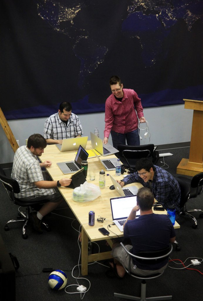 Employees of Cash Star, a Portland-based national company, brainstorm Thursday at Think Tank, a local business that rents office-style work space shared by freelancers and startups.