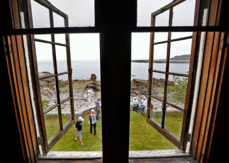 Visitors take a tour of the buildings at Timber Point in the Rachel Carson Wildlife Refuge in Biddeford in 2013.