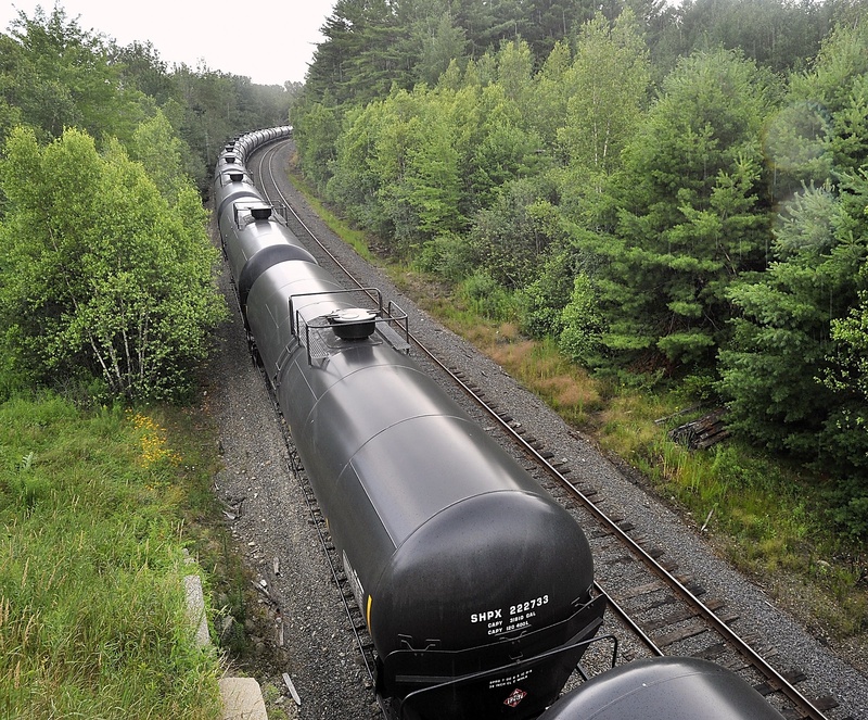 Petroleum transport rail cars sit on a siding near Route 115 in Yarmouth.