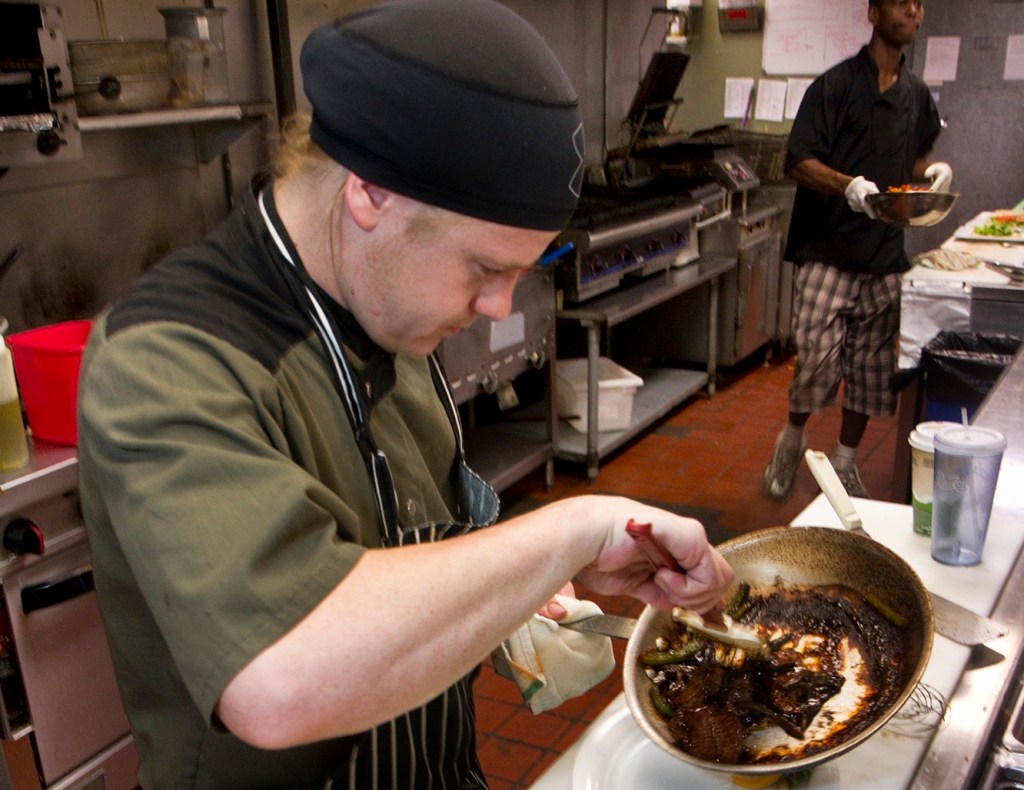 James Santamore and Bernard McBean, chefs at Jimmy the Greek’s, prepare lunches at the Maine Mall restaurant. Owner Jim Albert, who started with his first Jimmy the Greek’s in Old Orchard Beach in 2008, used a 504 loan to open this South Portland location in 2011.