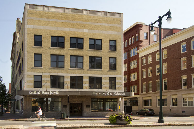 A hotel developer is buying the former Portland Press Herald building, above, on Congress Street, with plans to convert it into The Press Hotel.