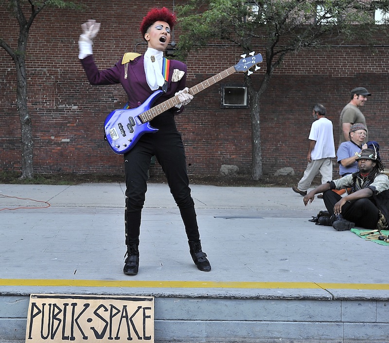 Aquarius LaFunkk performs "Baby, I'm a Star" by Prince as some entertainment was presented by supporters during their occupation of Congress Square Plaza on Friday, Sept. 6, 2013.