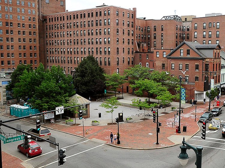 The space at Congress and High streets, which started out holding a wooden row house, has undergone many changes over the years. Walgreen’s replaced the row house, and Dunkin’ Donuts moved in later. In the 1980s, the space was converted into a plaza. Most recently, the city wanted to sell most of the half-acre park to a hotel owner but voters decided to protect it.