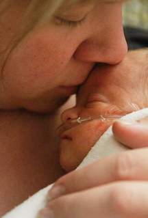 Nicole Wheeler holds her son Charlie in the hospital. He died of cancer Dec. 7, 2012 – 17 days after he was born. “He never cried,” she said. “He had such positive energy and love.”