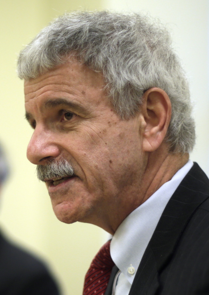 Assistant Senate Republican Leader Roger Katz, right, and Sen. Thomas Saviello, discuss details of their proposal to expand Medicaid under the Affordable Care Act while implementing other significant changes to the program, Tuesday, Feb. 25, 2014, at the State House in Augusta, Maine. The expansion would be paired with a plan to implement managed care in the Medicaid program to try to curb costs. (AP Photo/Robert F. Bukaty)