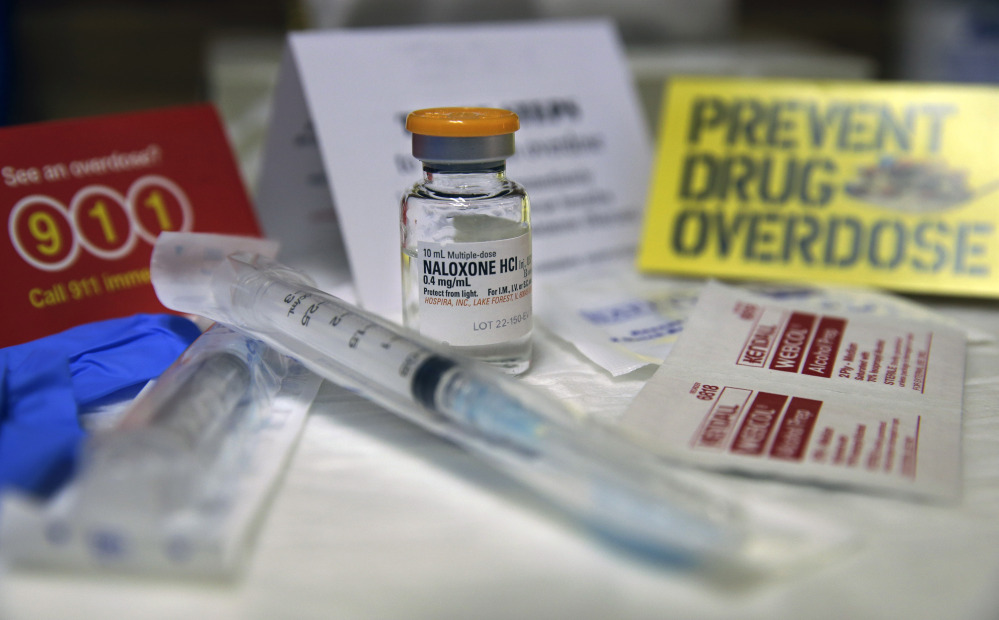 A kit with naloxone, also known by its brand name Narcan, is displayed at the South Jersey AIDS Alliance in Atlantic City, N.J. on Wednesday, Feb. 19, 2014. An overdose of opiates essentially makes the body forget to breathe. Naloxone works by blocking the brain receptors that opiates latch onto and helping the body “remember” to take in air.