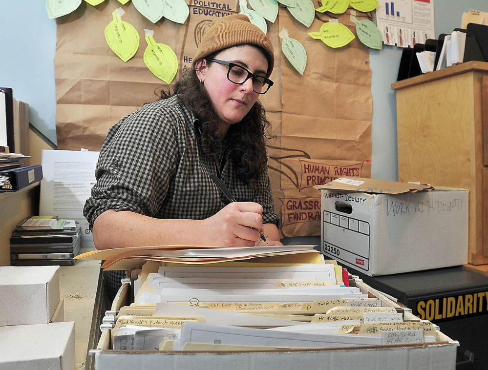 Drew Joy of Portland works at the office Wednesday as a volunteer community organizer. Joy, a carpenter, has been without health insurance for a decade and would like to see Medicaid expanded.