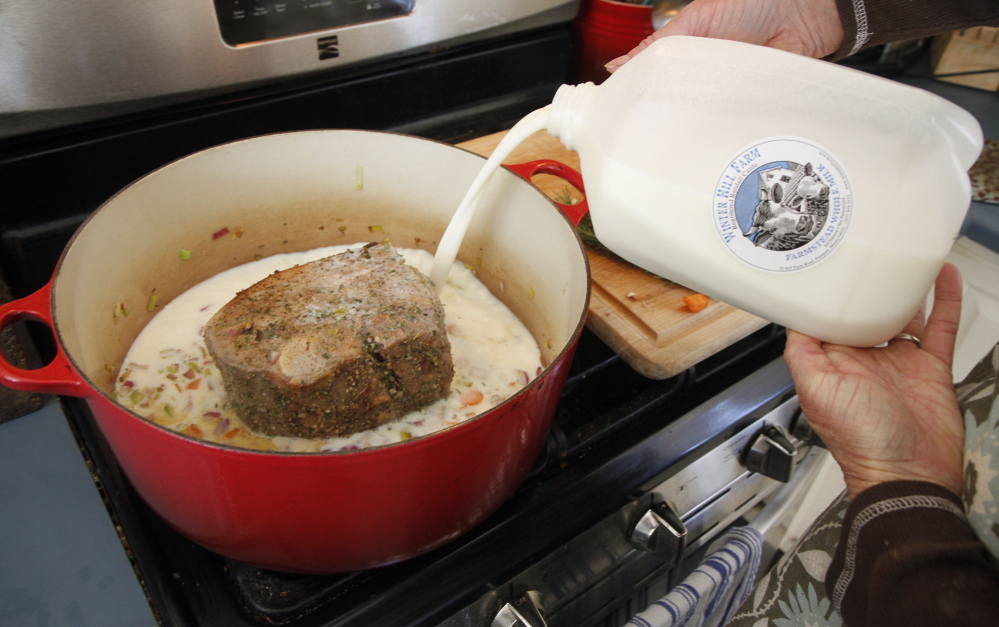 In goes the milk. The milk curdles as it cooks, which doesn’t look pretty, but the cheese curds taste delicious.