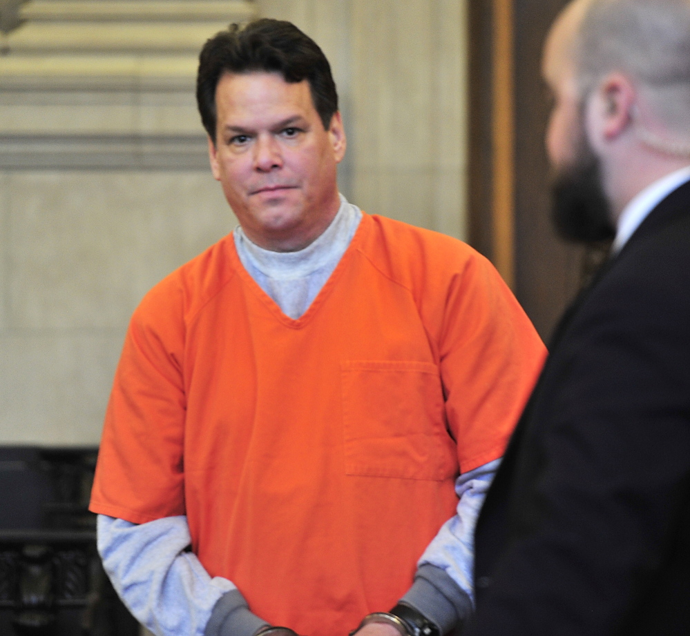 In this November 2013 file photo, Dennis Dechaine listens in Superior Court as DNA experts testify at his request for a new trial.