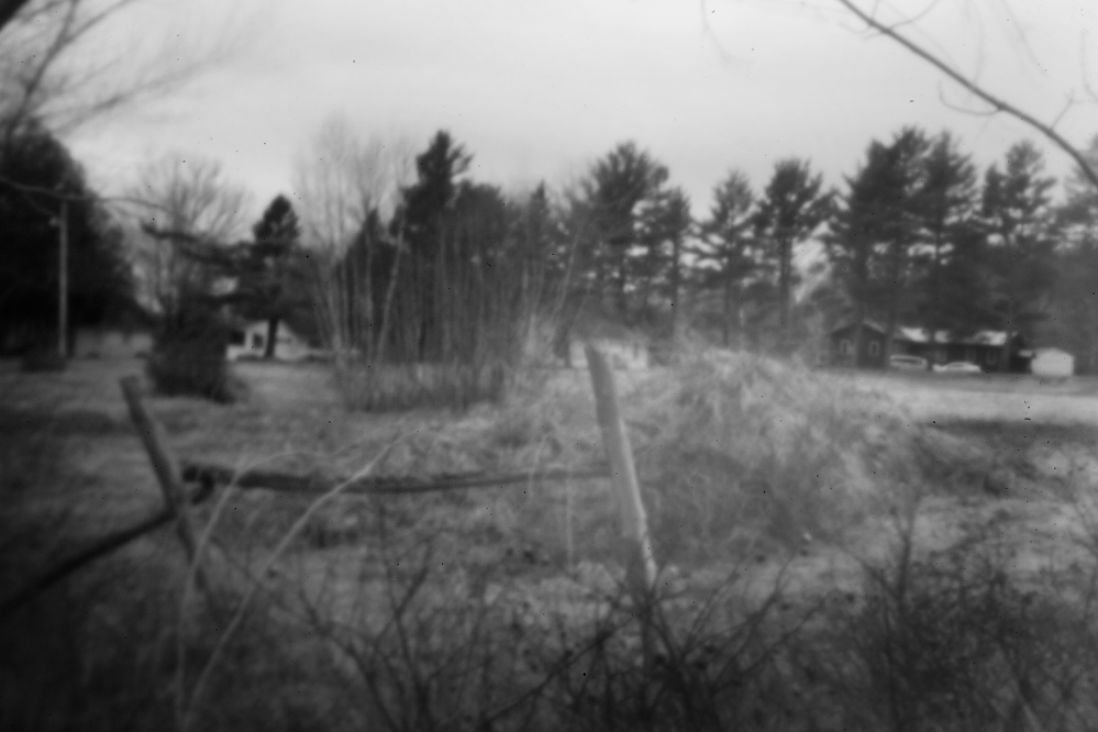 Just off Route 1 in Indian Township, this gravel pile, now a grass-covered mound, is where a group of Passamaquoddy sat in protest in 1964 to stop a white man from building a road on reservation land. The arrests that followed brought members of the tribe and Don Gellers together.