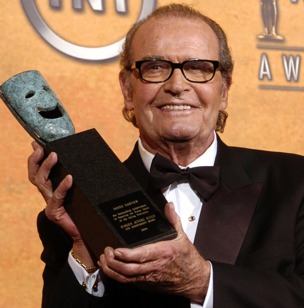 James Garner holds his life achievement award from the Screen Actors Guild in 2005.