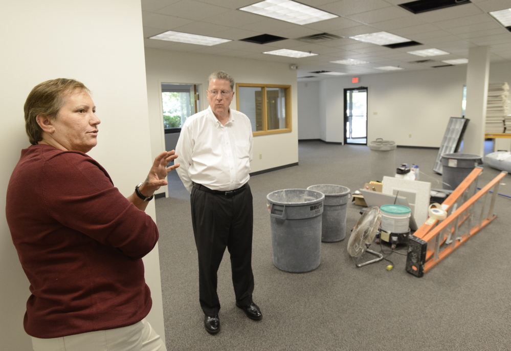 SOUTH PORTLAND, ME - AUGUST 1: Myra Orifice and Robert Harrison of LogistiCare show their new office space at 400 Southborough Drive in South Portland.  (Photo by John Patriquin/Staff Photographer)