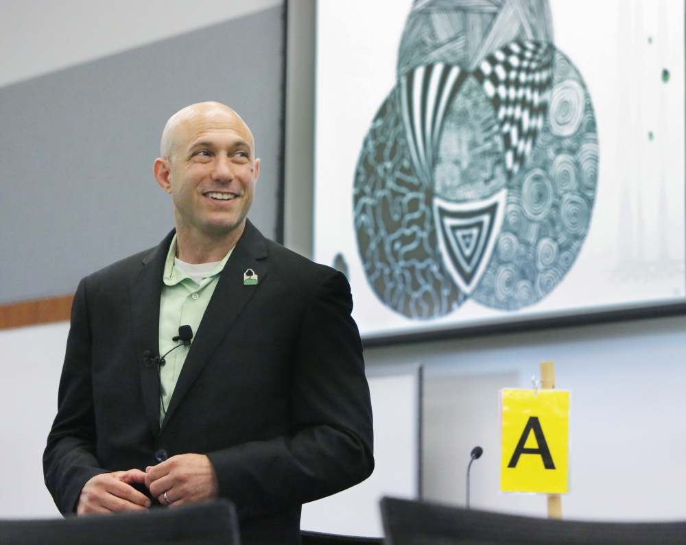 Dr. Jeremy Richman talks with students and faculty at UNE in Biddeford. His daughter Avielle was killed in the Sandy Hook school shooting and he is studying whether there are neurological signs that predispose people toward violence.